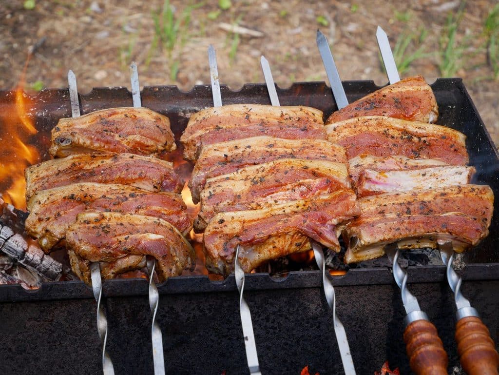 Skewered Meat With Fat On The Grill