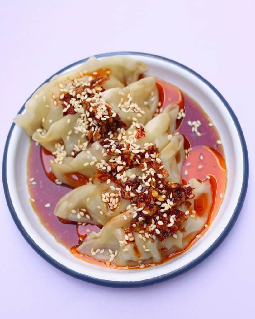 Steamed Pork And Chive Dumplings With Chili Crisp