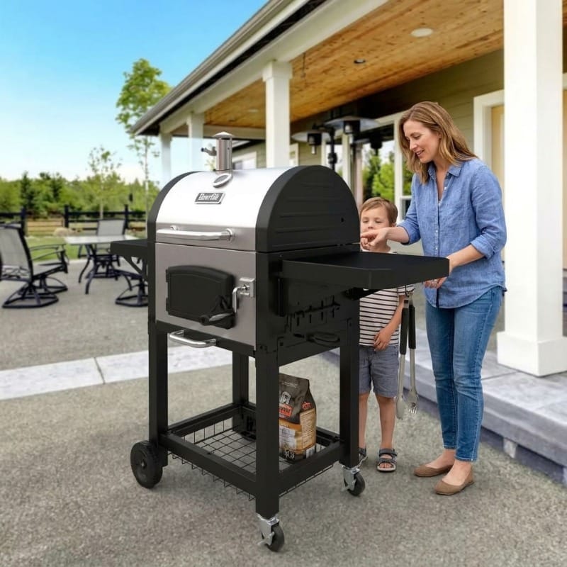 Mother And Son Inspect The Dyna-Glo Grill