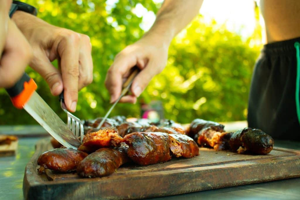 Serving Romanian Meech Sausages